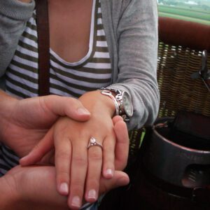 A woman being proposed to on a Lancaster Balloon Rides hot air balloon