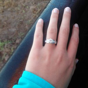 A woman with an engagement ring that was proposed to on a Lancaster Balloon Rides hot air balloon