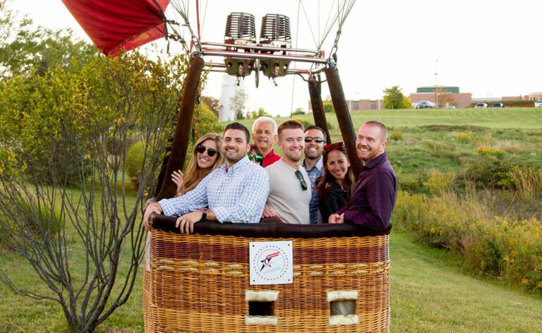 Employees smiling while on a corporate event at Lancaster Balloon Rides