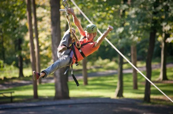 Woman on a thrilling zipline ride - adventurous things to do in PA